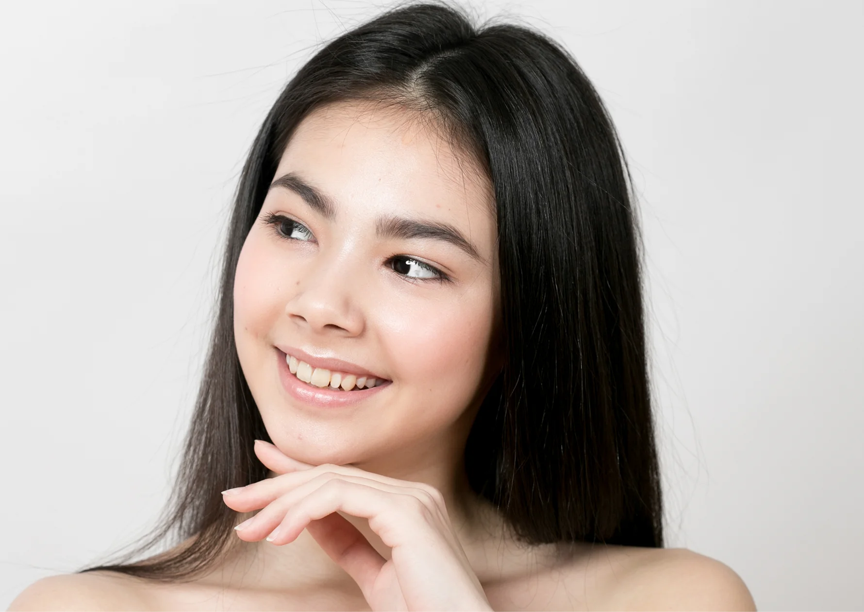 Woman with smooth, luminous skin
